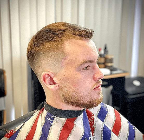 A happy young client of Rashada's cuts & more of Dothan, Alabama