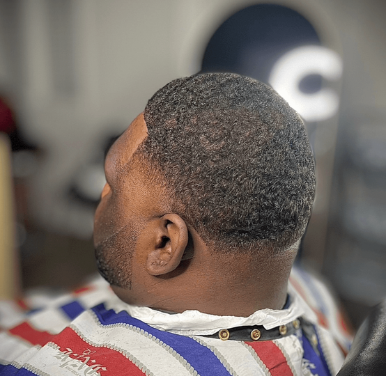 A happy client of Rashada's cuts & more of Dothan, Alabama